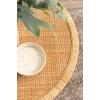 imageKate and Laurel Rafina Coastal Round Rattan Coffee Table 28 x 28 x 18 Natural Brown Transitional Boho Circle Woven Rattan Living Room Coffee Table with Storage Shelf Below