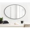 image:imageKate and Laurel Zayda Oval Framed Wall Mirror 24 x 36 Silver Metal Minimalist Oval Mirror with Smooth CurvesBlack