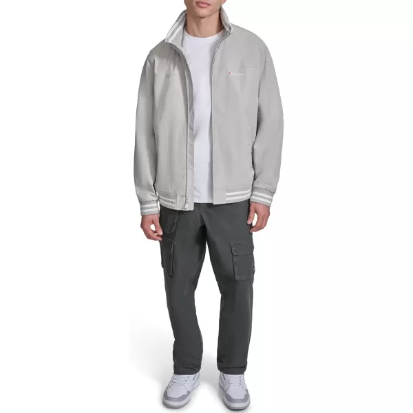 imageChampion Mens Water Resistant Varsity Bomber Jacket with Flex Stand CollarOyster