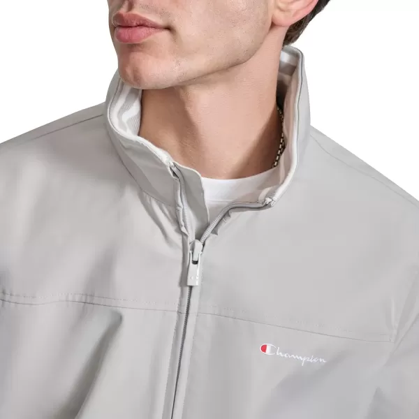 imageChampion Mens Water Resistant Varsity Bomber Jacket with Flex Stand CollarOyster