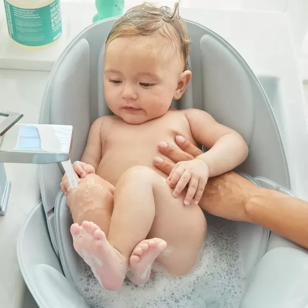 imageFrida Baby Soft Sink Baby Bath Seat  Sink Bather for Baby  Easy to Clean Baby Bathtub  Bath Cushion That Supports Babys HeadSoft Sink