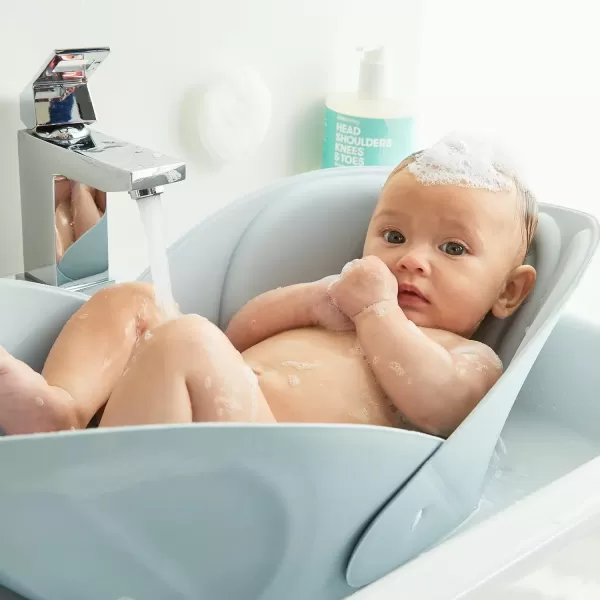 imageFrida Baby Soft Sink Baby Bath Seat  Sink Bather for Baby  Easy to Clean Baby Bathtub  Bath Cushion That Supports Babys HeadSoft Sink