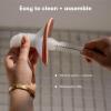 imageFrida Mom 2in1 Manual Breast Pump with HandsFree Silicone Suction Cup Milk Collector Wireless Ergonomic Handle and SoftFeel Flange for Breastfeeding27MM Flange