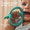 imageFrida Baby GetAGrip BabyTeether for Teething Relief  100 FoodGrade Silicone Teething Toys for Baby 06 12 18 Months Infant BPAFree PVCFree  PinkMuted Teal