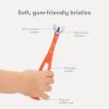 imageFrida Baby TripleAngle Toothhugger Training Toddler Toothbrush  Toddler Toothbrush 2 Years and Up Cleans All Sides at Once  YellowPink  Blue