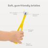 imageFrida Baby TripleAngle Toothhugger Training Toddler Toothbrush  Toddler Toothbrush 2 Years and Up Cleans All Sides at Once  YellowYellow  Pink