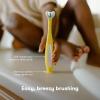 imageFrida Baby TripleAngle Toothhugger Training Toddler Toothbrush  Toddler Toothbrush 2 Years and Up Cleans All Sides at Once  YellowYellow