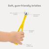 imageFrida Baby TripleAngle Toothhugger Training Toddler Toothbrush  Toddler Toothbrush 2 Years and Up Cleans All Sides at Once  YellowYellow