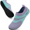 imageWateLves Barefoot Water Shoes for Women Men Travel Slippers Socks House Shoes QuickDry Aqua Socks for Beach Swim Pilates Yoga Dancing Camping Must Haves715Purple Green